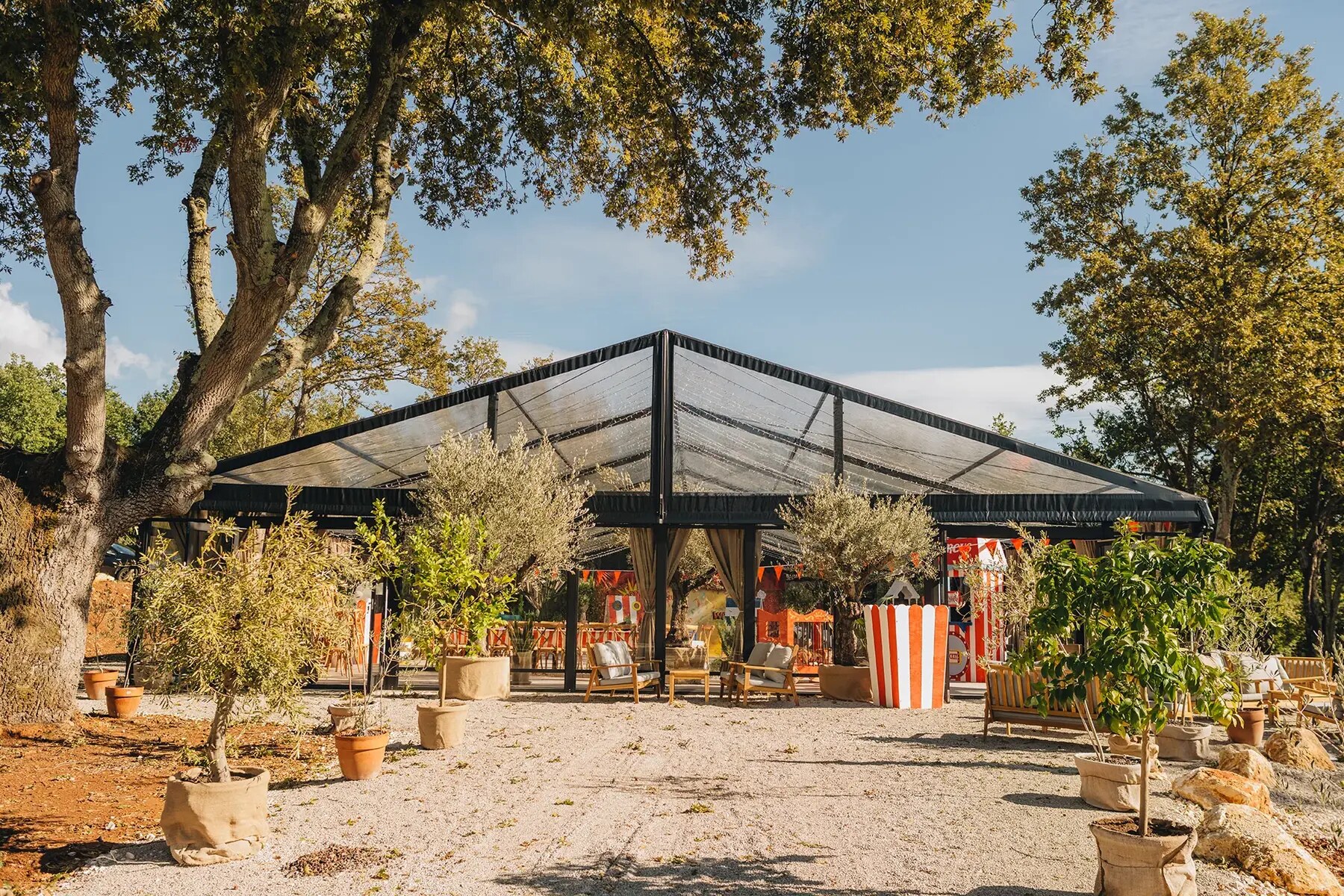 D'Orangerie venue surrounded by Mediterranean greenery